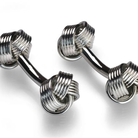 A pair of silver colour cufflinks with a knot on both sides