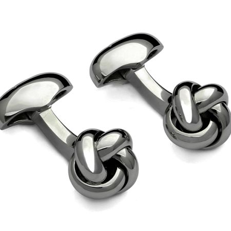 A pair of black metal cufflinks in the shape of a modern smooth knot