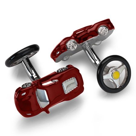 A pair of cufflinks in the shape of a red sports car, the back features a steering wheel